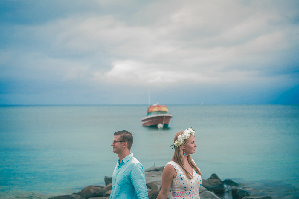 antigua wedding photographer-bride and groom with boat